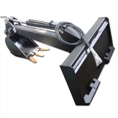 Minicarregadeira com implemento de retroescavadeira